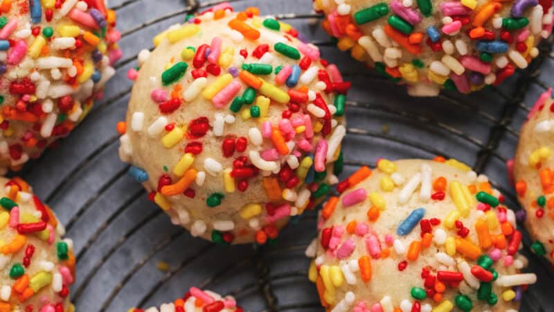 up close cookies with sprinkles on cooling rack