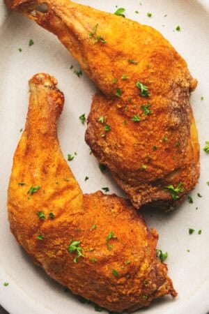 two air fryer chicken legs on plate
