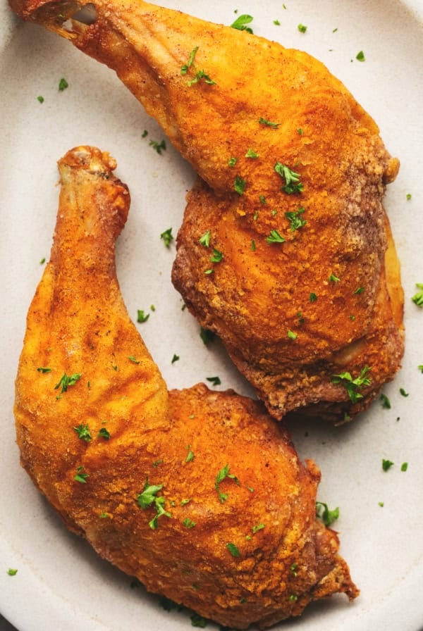 two air fryer chicken legs on plate