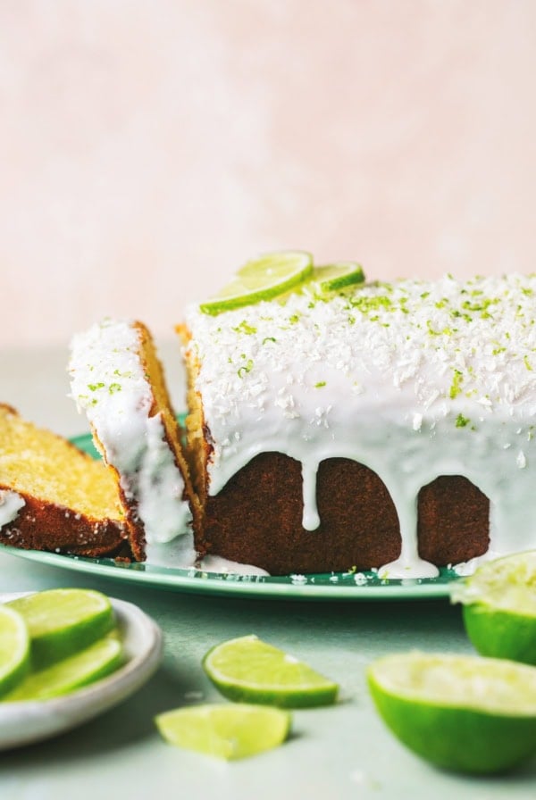 pound cake with icing and lime slices