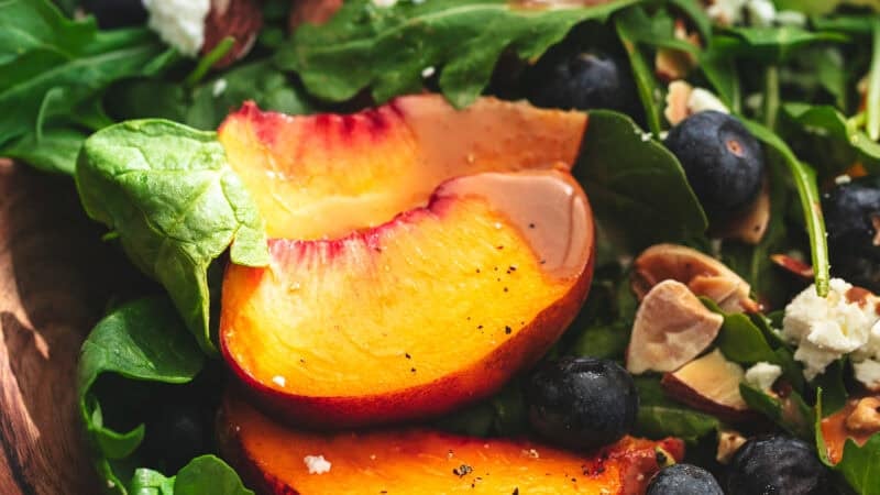 up close view of peaches, lettuce, blueberries, almonds