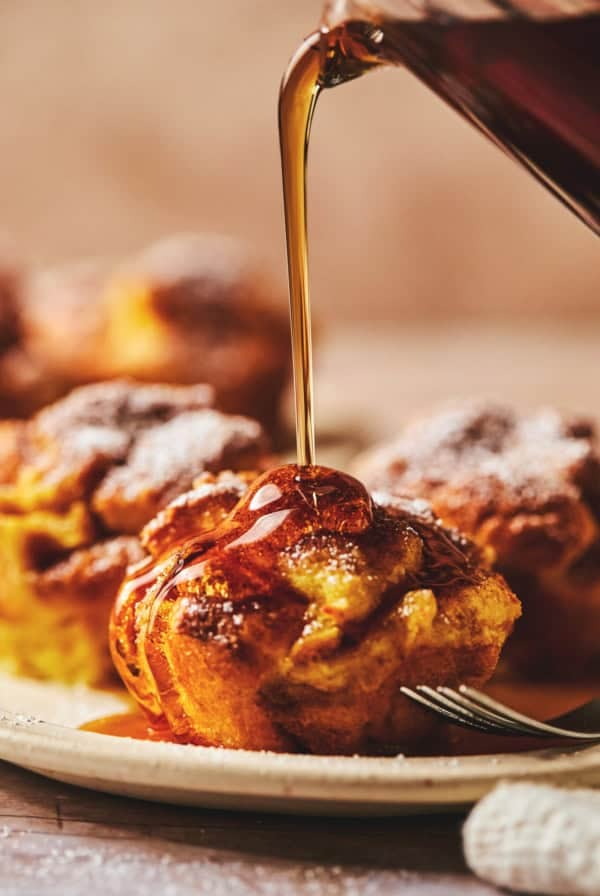 syrup pouring onto french toast muffin