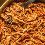 shredded hawaiian bbq chicken with fork in bowl