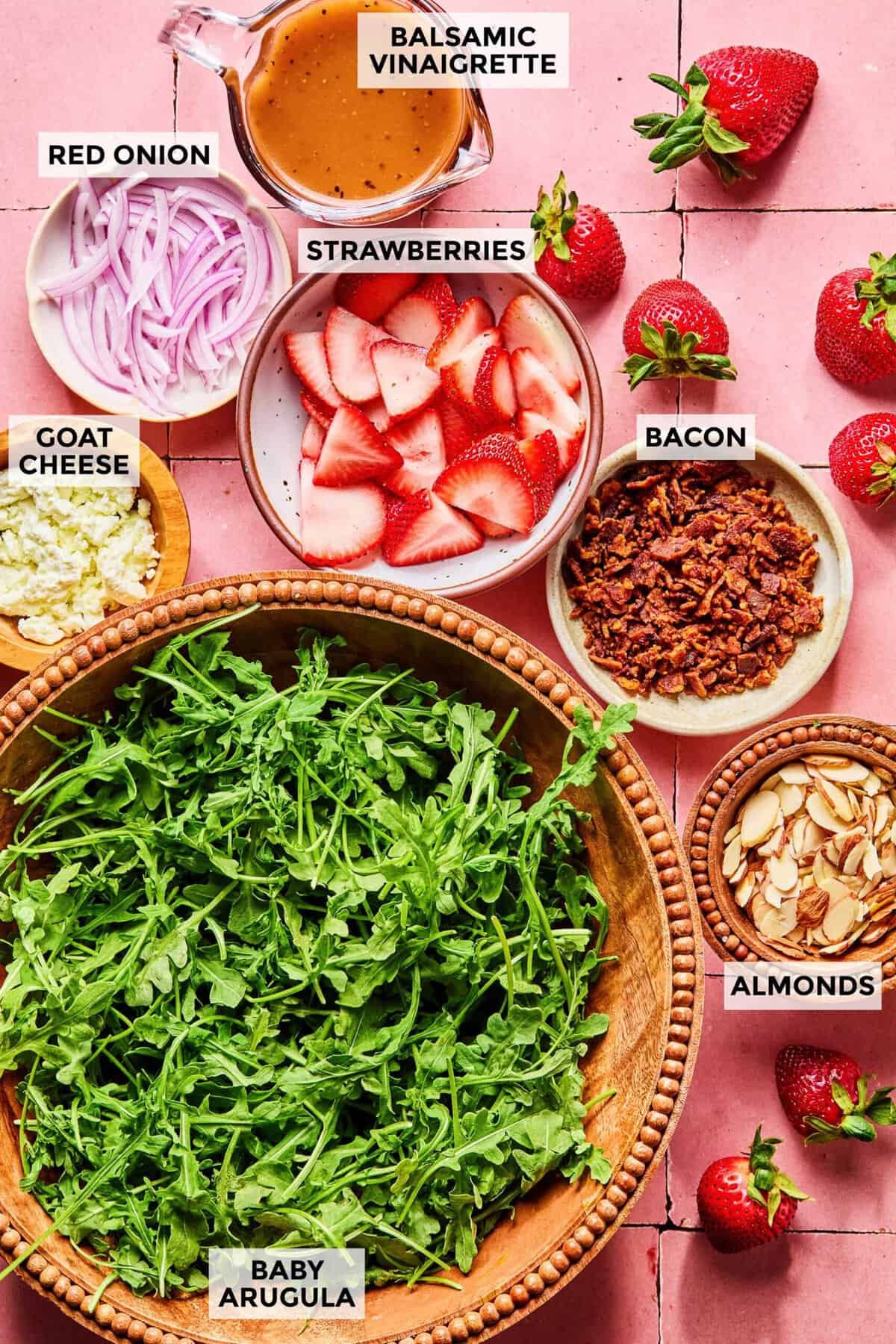 Ingredients for strawberry arugula salad.